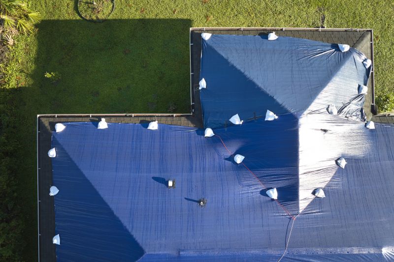 Storm Damage Roof Tarping in Evergreen, CO